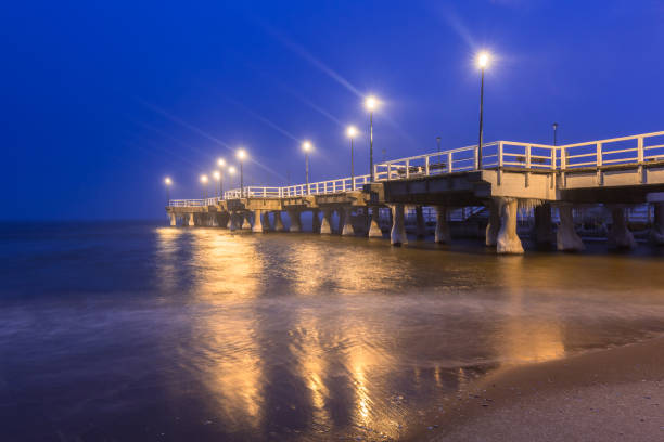 istock Baltic Sea pier in Gdansk at dusk 929037580