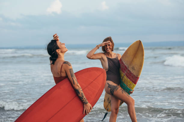 istock Young women surfers 929038796