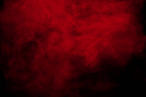 fumo rosso astratto su sfondo nero. nuvole di colore rosso. - red foto e immagini stock