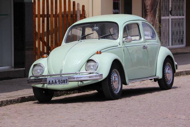 Brazil Volkswagen Morretes: Classic VW Beetle parked in Morretes, Brazil. More than 3.3 million VW Beetles have been produced in Brazil. beetle stock pictures, royalty-free photos & images