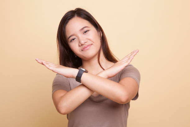 istock Beautiful young Asian woman say no. 929063440