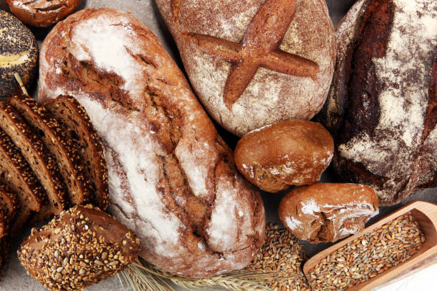 istock Different kinds of bread and bread rolls. Kitchen or bakery poster 929071302