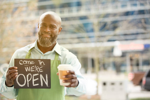 istock Small business owner, man in downtown city area. 929071864