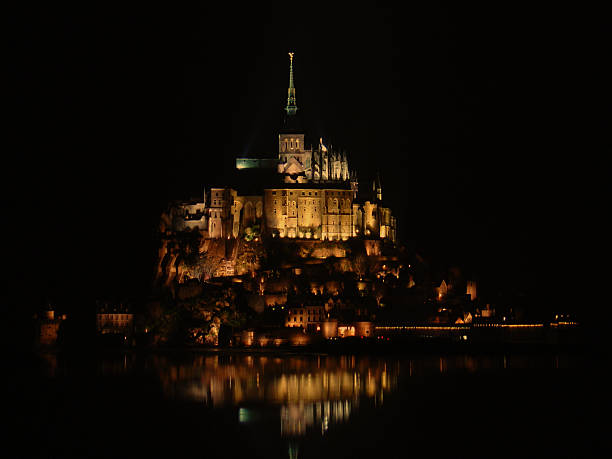 istock Mont Saint Michel and its Bay by Night 92907643