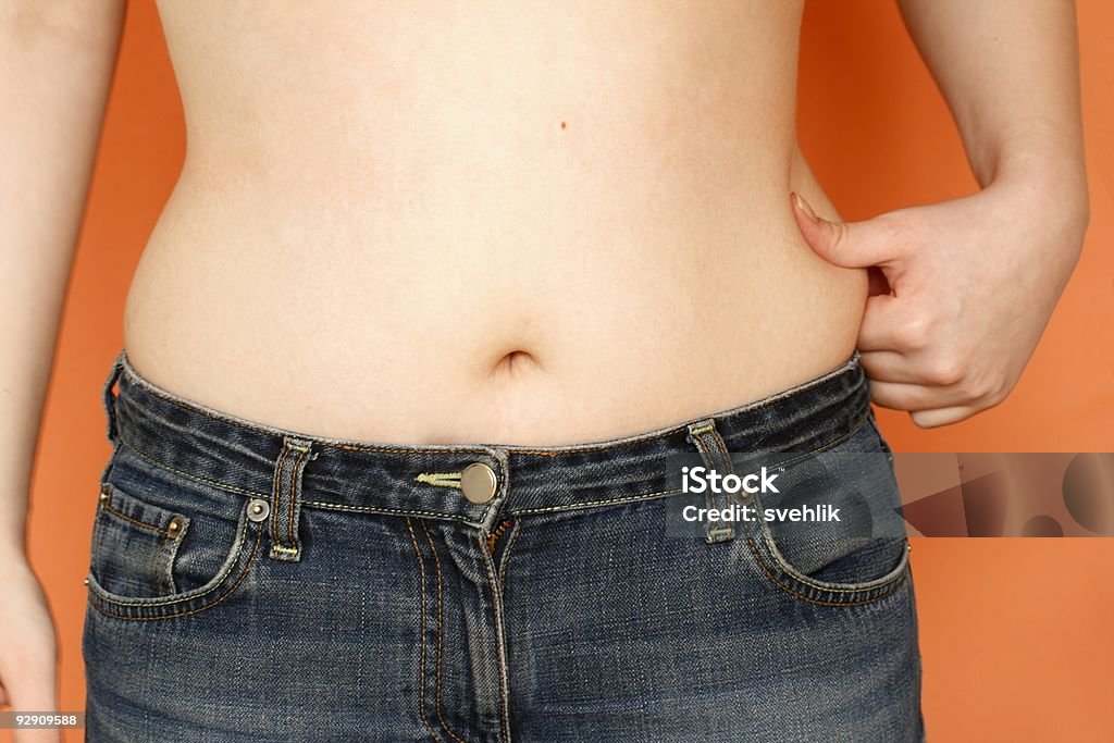 Girl and her problem waist  Women Stock Photo