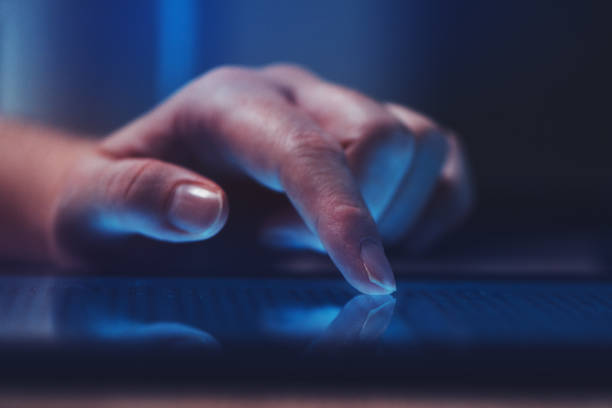 istock Extreme close up of female finger using digital tablet 929096208