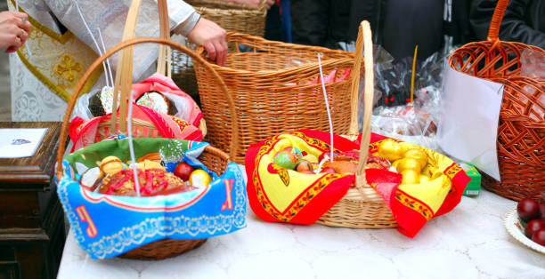istock People come to church consecrate Easter cakes and eggs 929101958