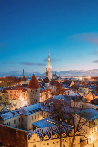 Tallinn, Estonia. Traditional Old Ancient Architecture Cityscape In Historic District Of Tallinn, Estonia. Winter Evening Night. Famous Landmark. Destination Scenic.