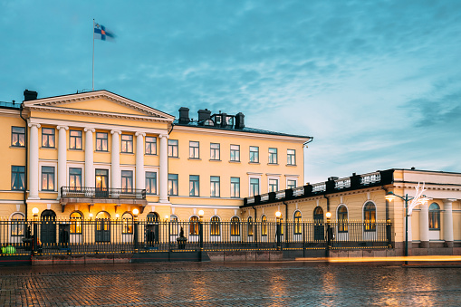 Helsinki, Finland. Presidential Palace In Evening Illuminations. It Contains Office Of President And Private Apartments For Official Functions And Receptions.