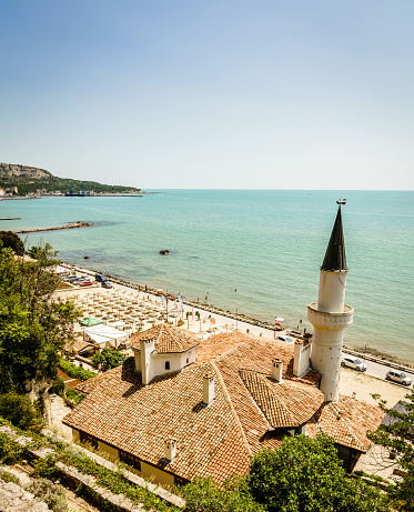 Scenic view of Black Sea coast in Balchik, Bulgaria with Balchik Palace in the foreground