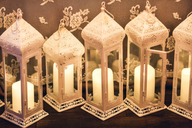 istock Candles in beautiful decorative lamps 929111848