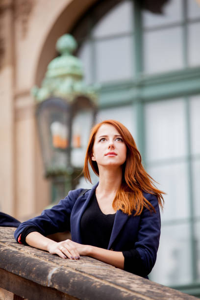 istock Young redhead girl in Dresden, Germany 929114370