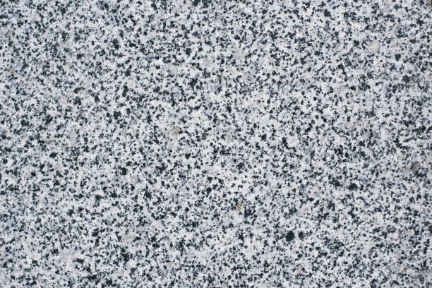 istock Texture of natural dark stone with inclusions, background 929143636