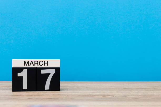 istock March 17th. Day 17 of march month, calendar on light blue background. Spring time, empty space for text, mockup 929145706