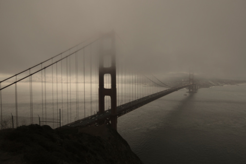 A part of the Golden Gate Bridge in the fog, taken on the bridge
