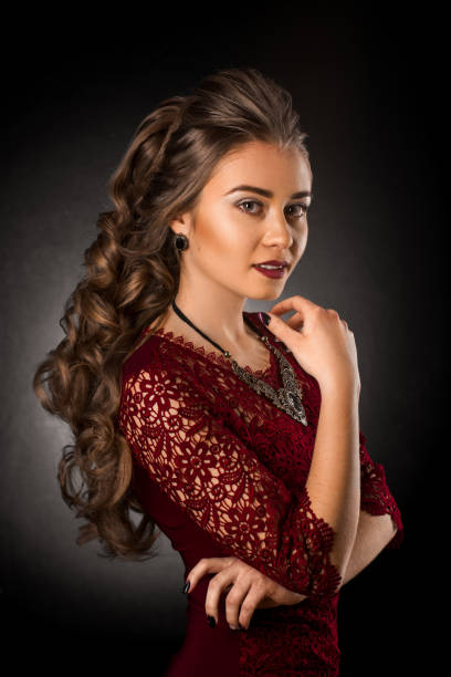 istock Charming young girl with beautiful curly hairstyle 929155682