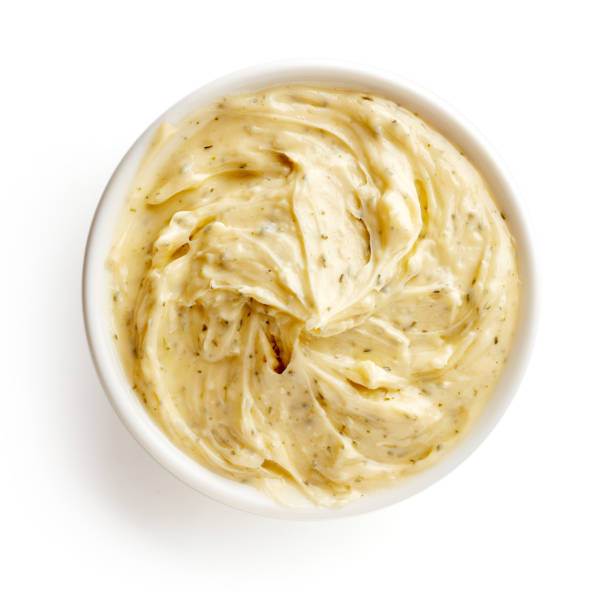 istock Bowl of herbal butter isolated on white, from above 929162266