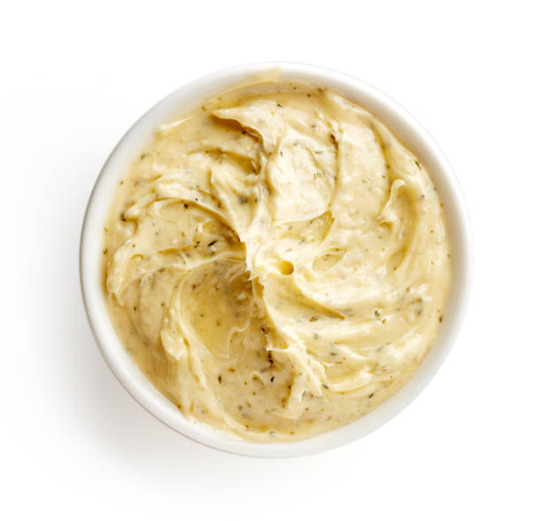 istock Bowl of herbal butter isolated on white, from above 929162278