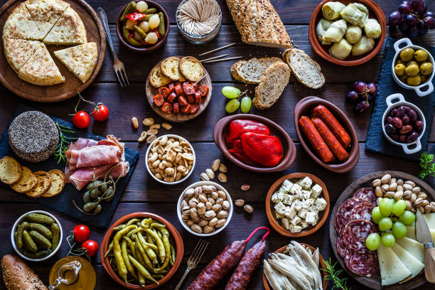 istock Tapas on rustic wooden table shot from above 929178028
