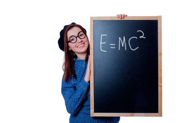 istock young girl with blackboard with formula on it 929179154