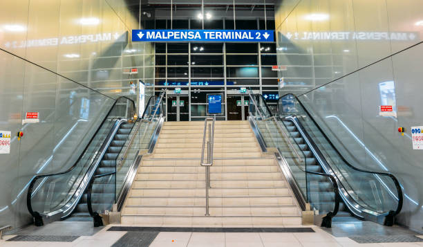 Sign pointing towards Malpensa Terminal 2, which services national as well as EasyJet flights throughout Europe stock photo