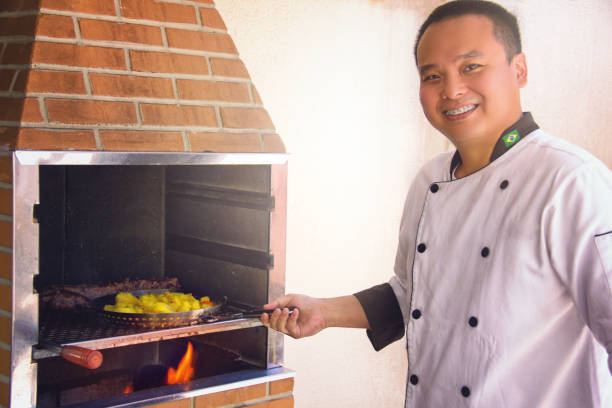 chef preparando churrasco. - asian ethnicity chef fine dining creativity - fotografias e filmes do acervo