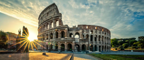 view of colloseum at sunrise - flavian amphitheater coliseum rome imagens e fotografias de stock