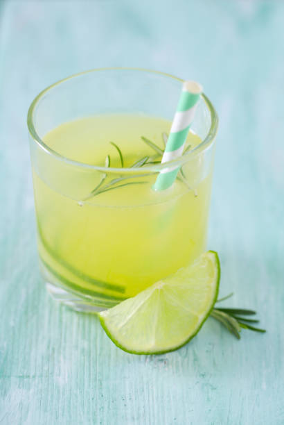 istock lime lemonade on wooden background 929195552