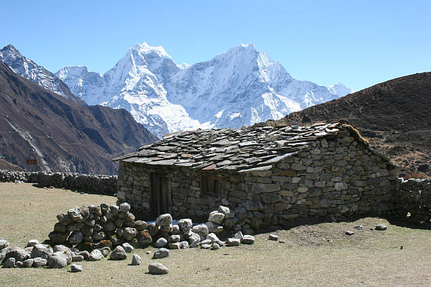 Farming lodge near Luza - Himalayas stock photo