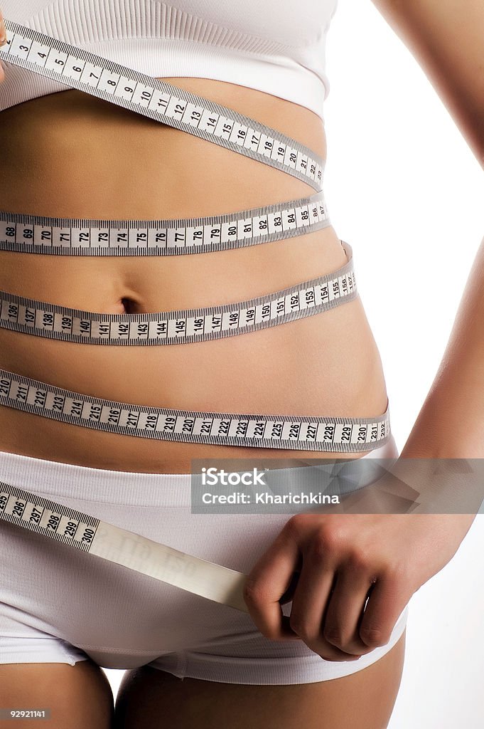 Mujeres tensa estómago - Foto de stock de Abdomen humano libre de derechos