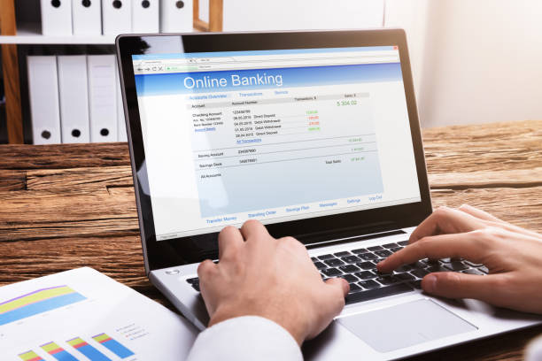 istock Businessperson Doing Online Banking On Laptop 929211618
