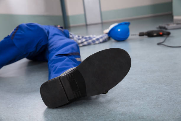istock Handyman's Helmet With Unconscious Handyman 929211754