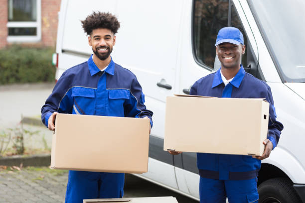 Two Men Holding The Cardboard Boxes