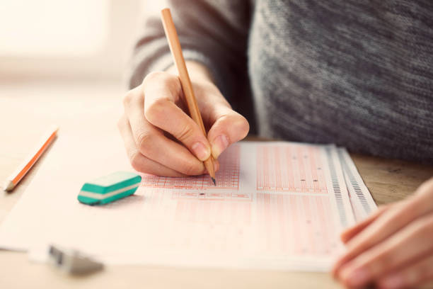 istock Young female student in examination 929219300
