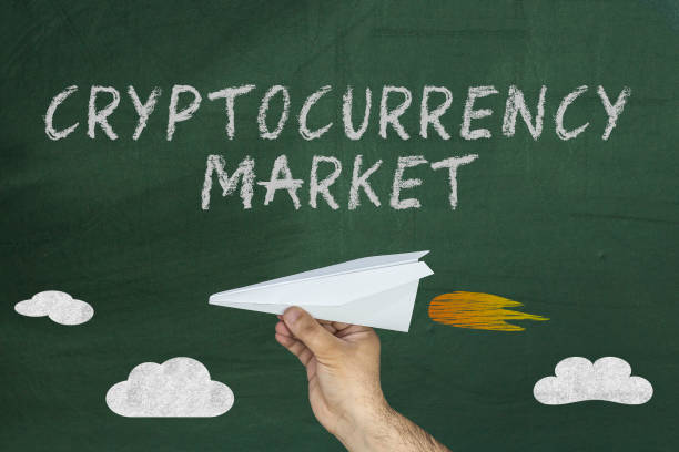 istock cryptocurrency market boosting concept. man holding paper plane 929221914