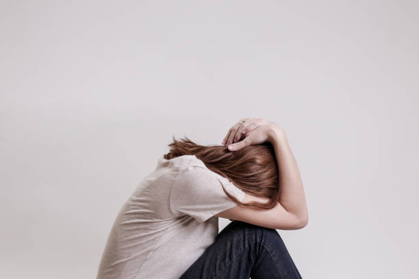 Portrait of lonley depressed woman, quiet anxiety concept stock photo