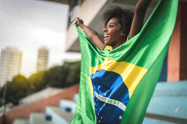 istock Happy Brazilian fan watching a soccer game 929248852