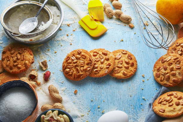 three round cookies on the blue wooden background
