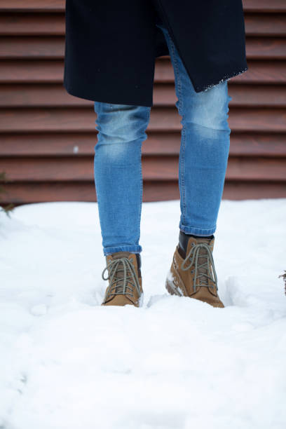 istock Male boots in snow 929287484