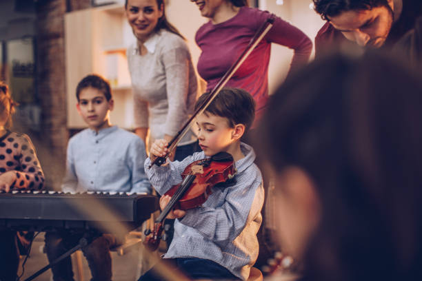 istock Children learning in music school 929299762