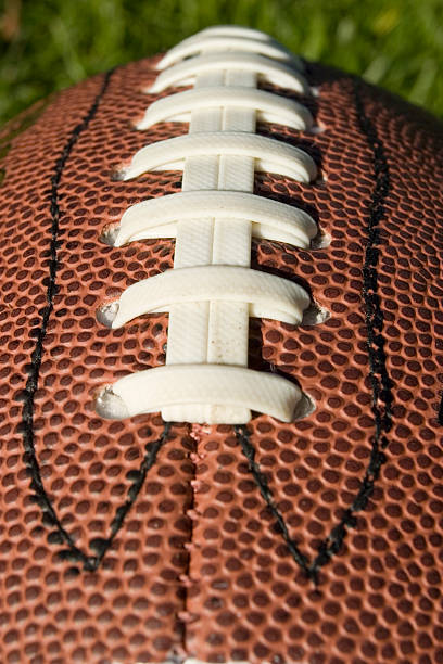 のボールのクローズアップ - american football playing touchdown team sport ストックフォトと画像