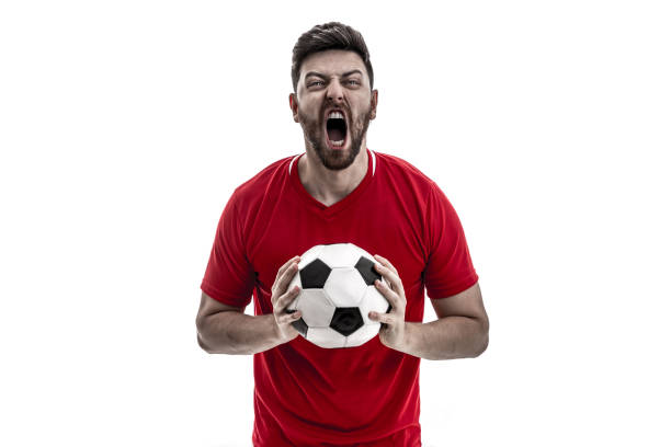 istock Fan / Sport Player on red uniform celebrating on white background 929308038