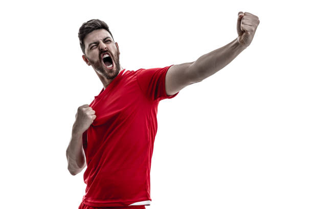 istock Fan / Sport Player on red uniform celebrating on white background 929308040