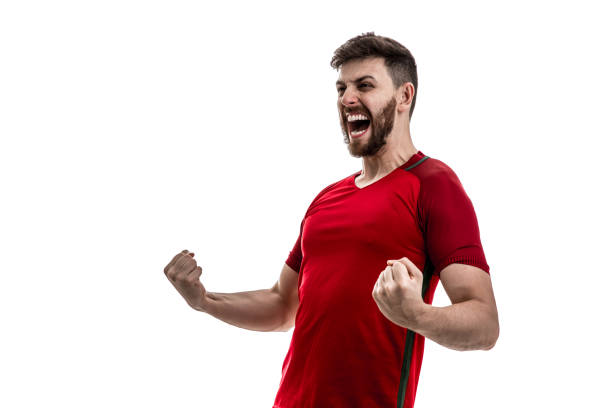 istock Fan / Sport Player on red uniform celebrating on white background 929308080