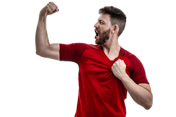 istock Fan / Sport Player on red uniform celebrating on white background 929308100