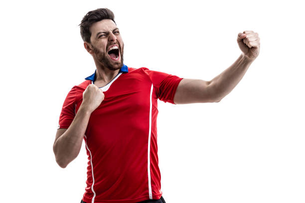 istock Fan / Sport Player on red uniform celebrating on white background 929308126