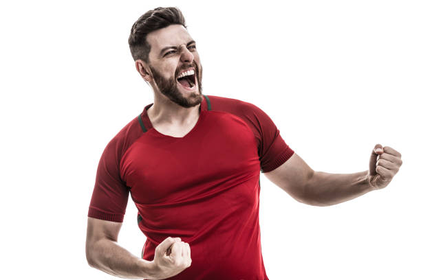 istock Fan / Sport Player on red uniform celebrating on white background 929308130