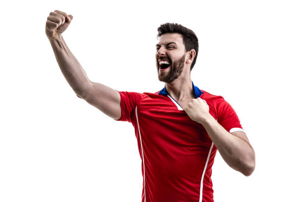 istock Fan / Sport Player on red uniform celebrating on white background 929308144