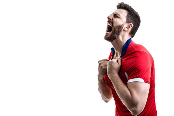 istock Fan / Sport Player on red uniform celebrating on white background 929308146