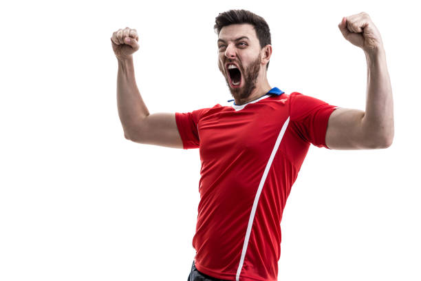 istock Fan / Sport Player on red uniform celebrating on white background 929308152